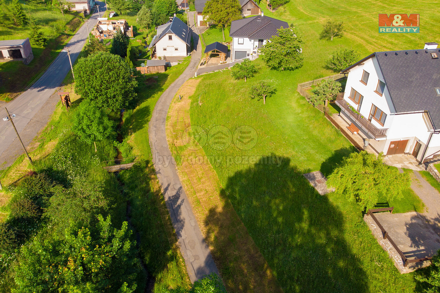 Prodej stavebního pozemku 604 m² — photo 2
