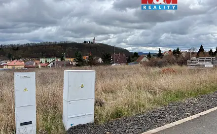Prodej stavebního pozemku 900 m², U Školky, Kryry, okres Louny