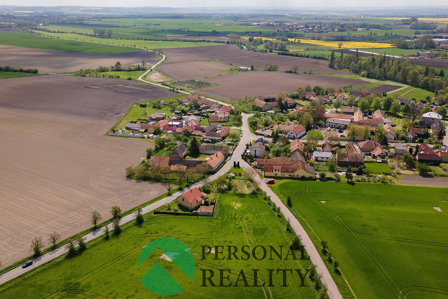 Prodej stavebního pozemku 910 m² – pohled 5