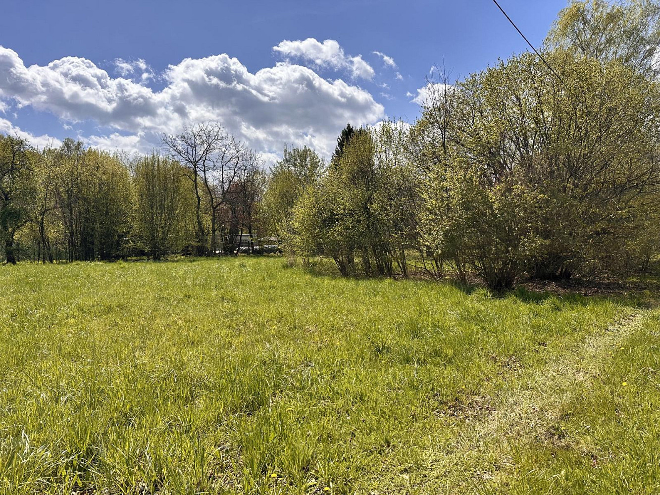Prodej stavebního pozemku 866 m² – pohled 2