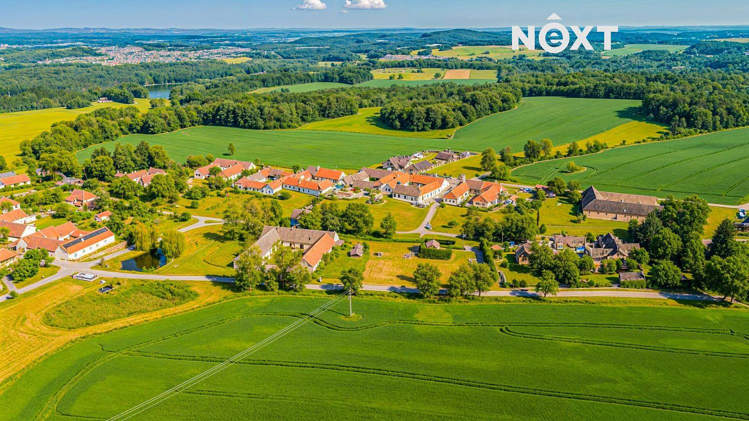 Prodej stavebního pozemku 902 m² – pohled 3