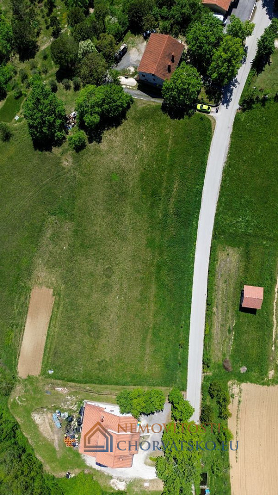 Prodej stavebního pozemku 1 265 m² - Widok 5
