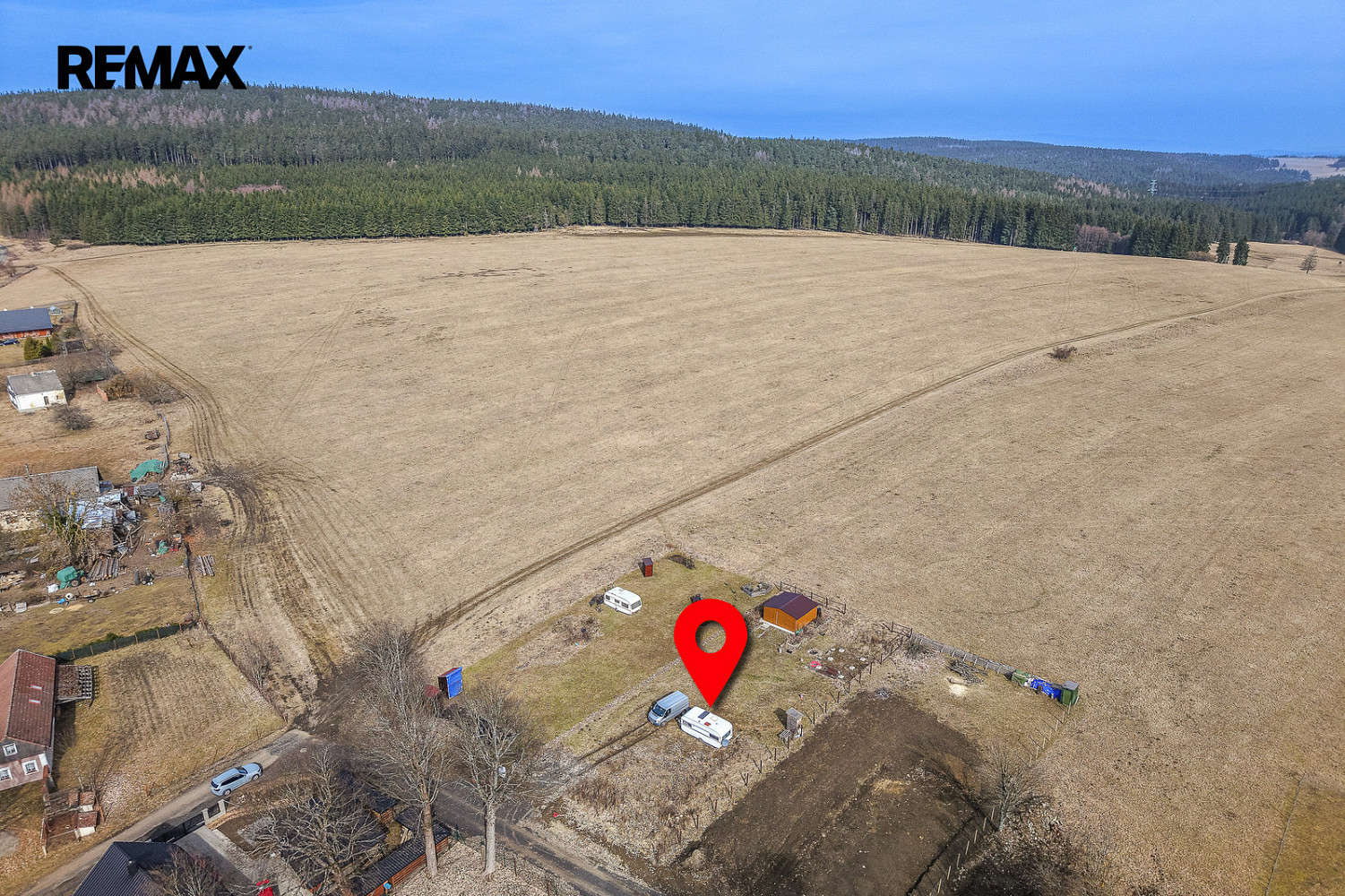 Prodej stavebního pozemku 971 m² – pohled 2