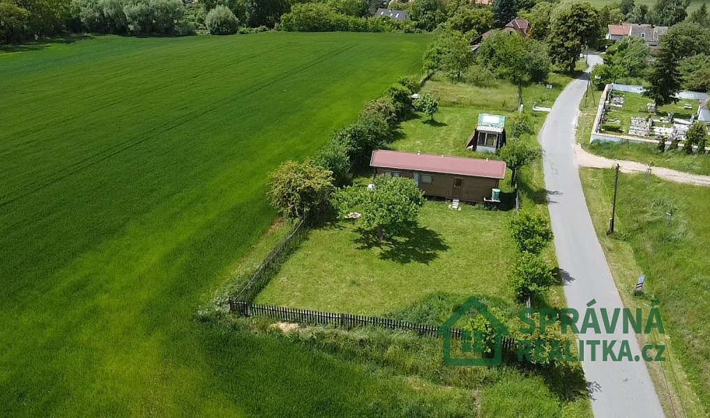 Prodej stavebního pozemku 972 m², Velečín – náhled fotky 2