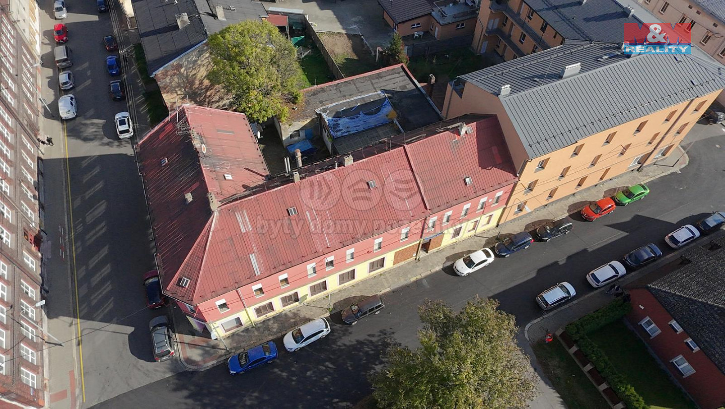 Prodej nájemního domu, činžáku 600 m²