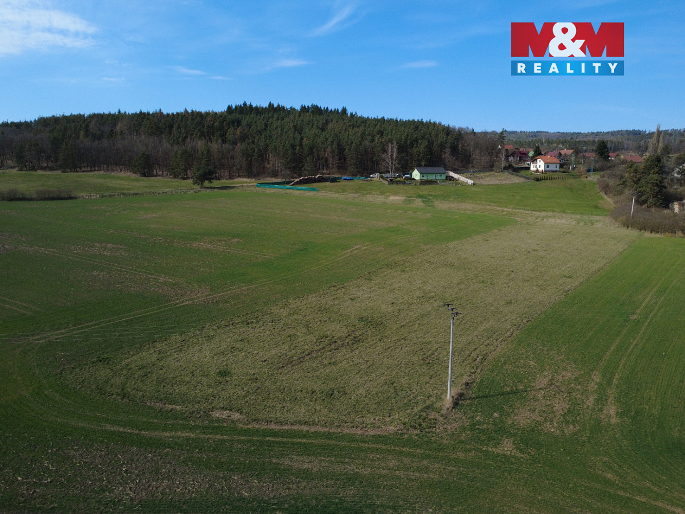 Prodej stavebního pozemku 5 130 m² – pohled 2