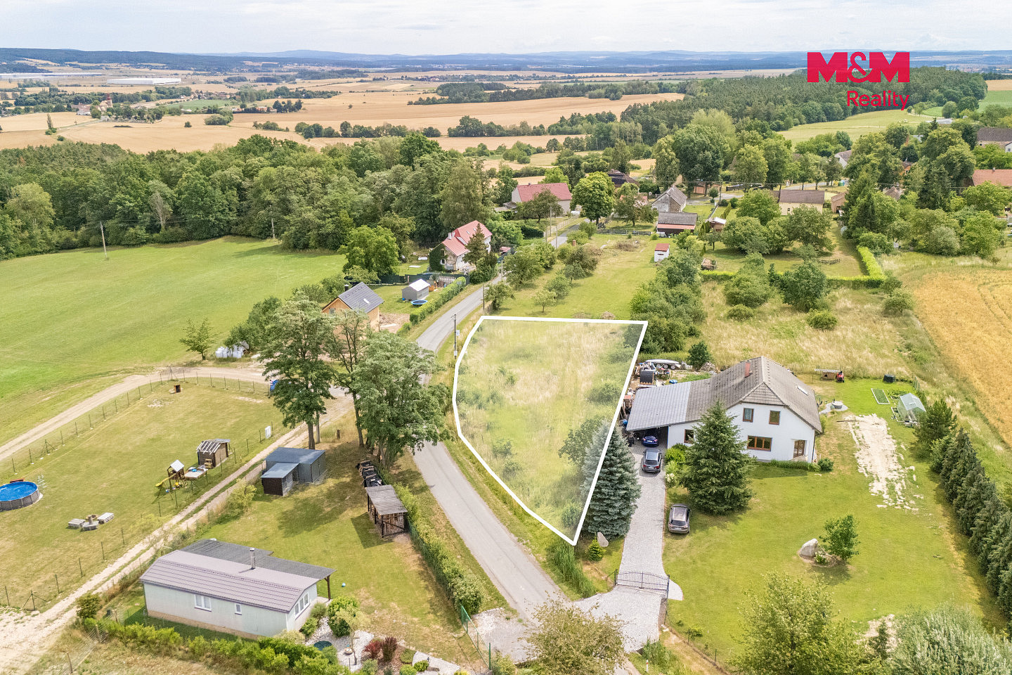 Prodej stavebního pozemku 1 176 m² – pohled 3