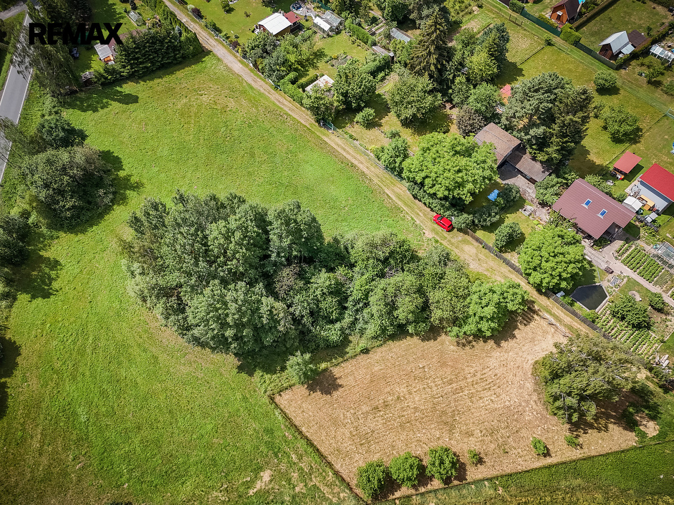 Prodej stavebního pozemku 877 m² — photo 3