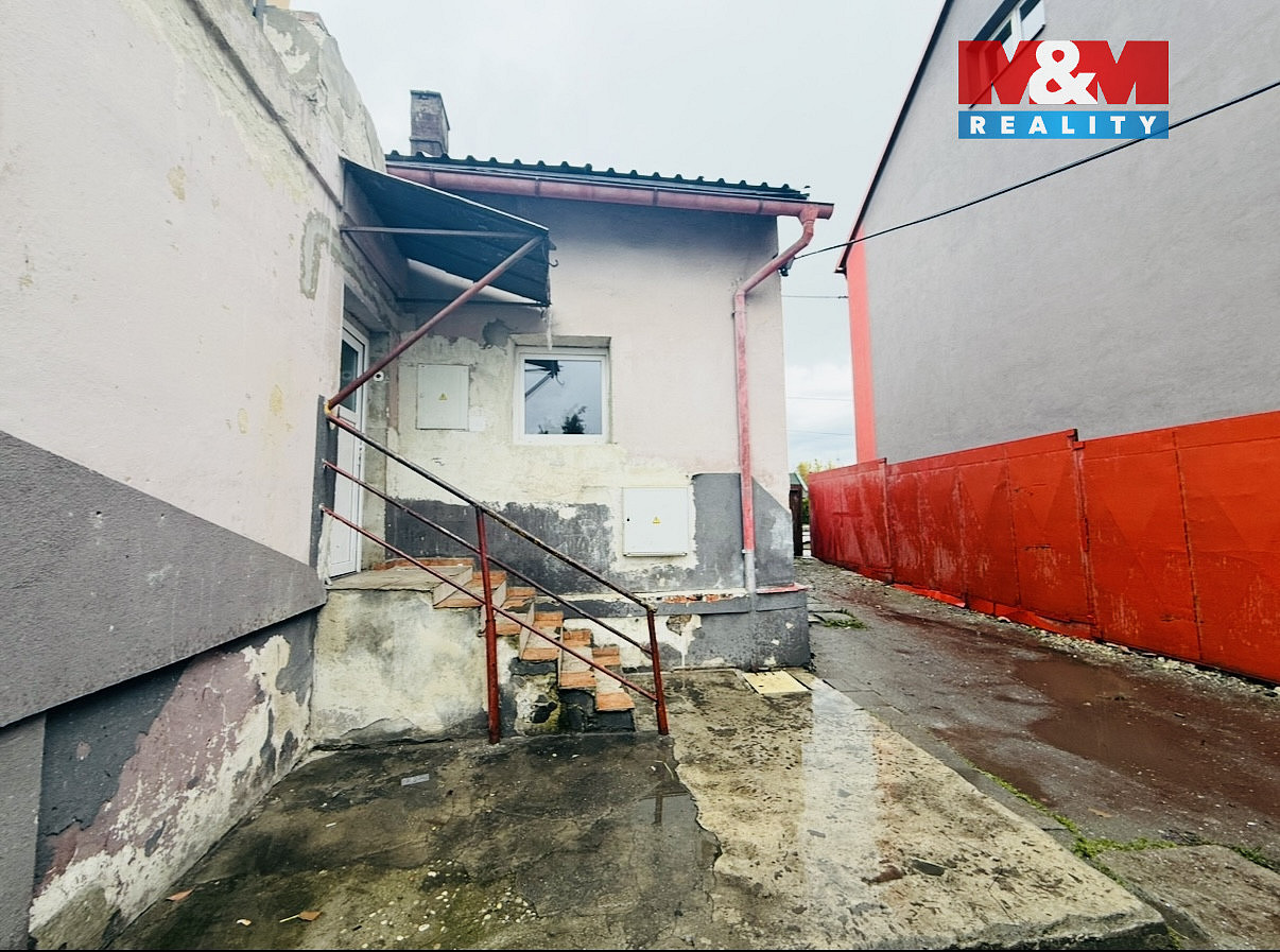 Prodej nájemního domu, činžáku 211 m² — photo 2