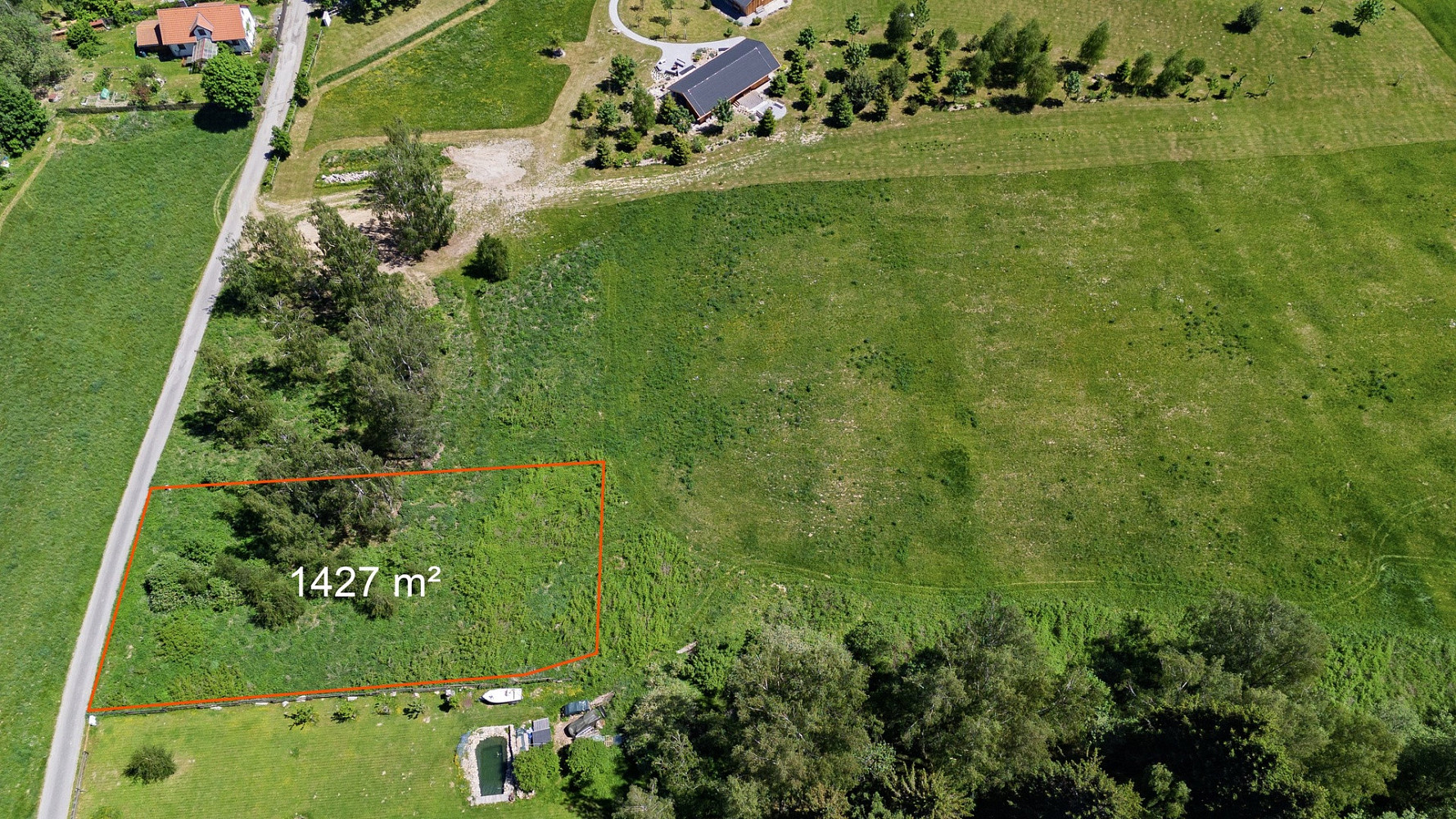 Prodej stavebního pozemku 1 427 m² — photo 2
