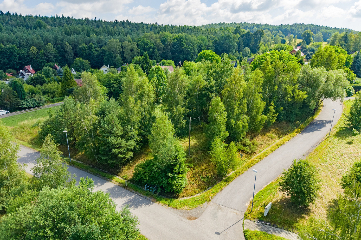 Prodej stavebního pozemku 2 392 m² - Więcej