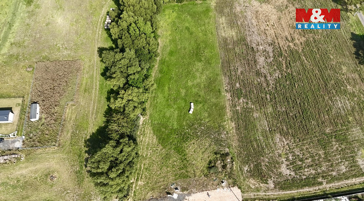Prodej stavebního pozemku 996 m² – pohled 4