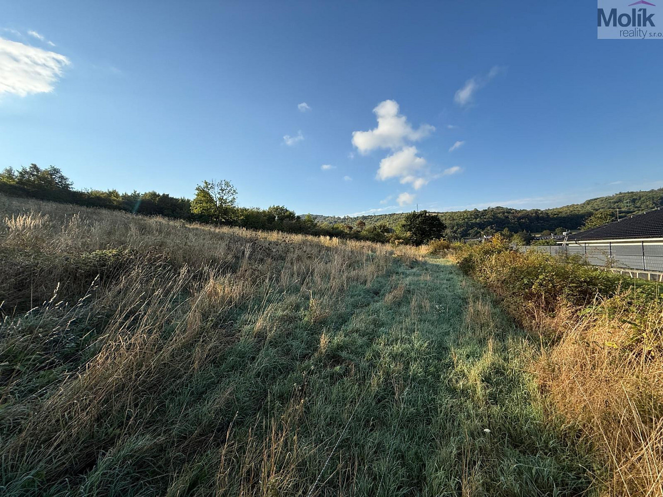 Prodej stavebního pozemku 1 645 m² – pohled 4