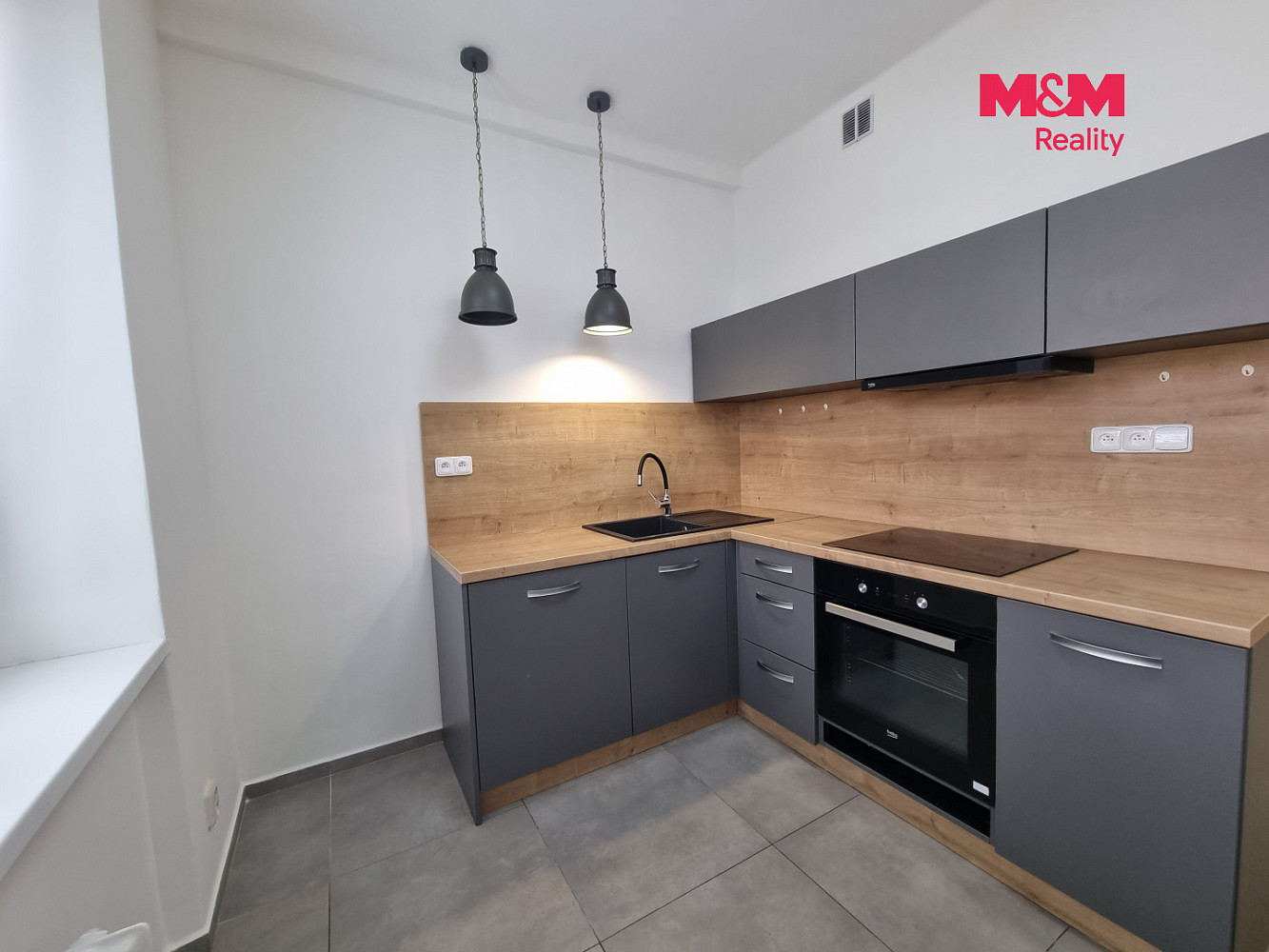 Pronájem bytu 1+1 38 m² — photo 2