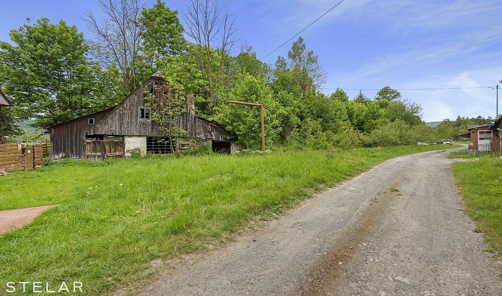 Prodej stavebního pozemku 1 316 m², Holčovice – náhled fotky 9