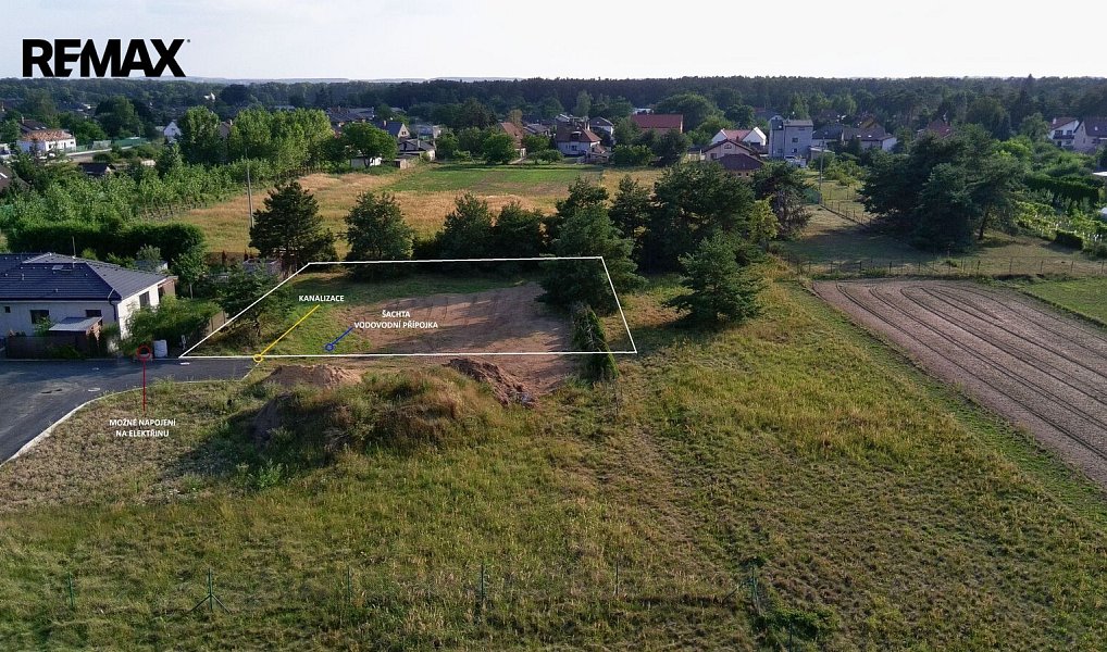 Prodej stavebního pozemku 1 087 m², Tišice – náhled fotky 2