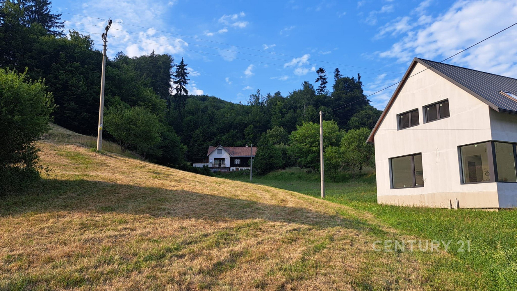 Prodej stavebního pozemku 2 361 m² Červenka – pohled 2