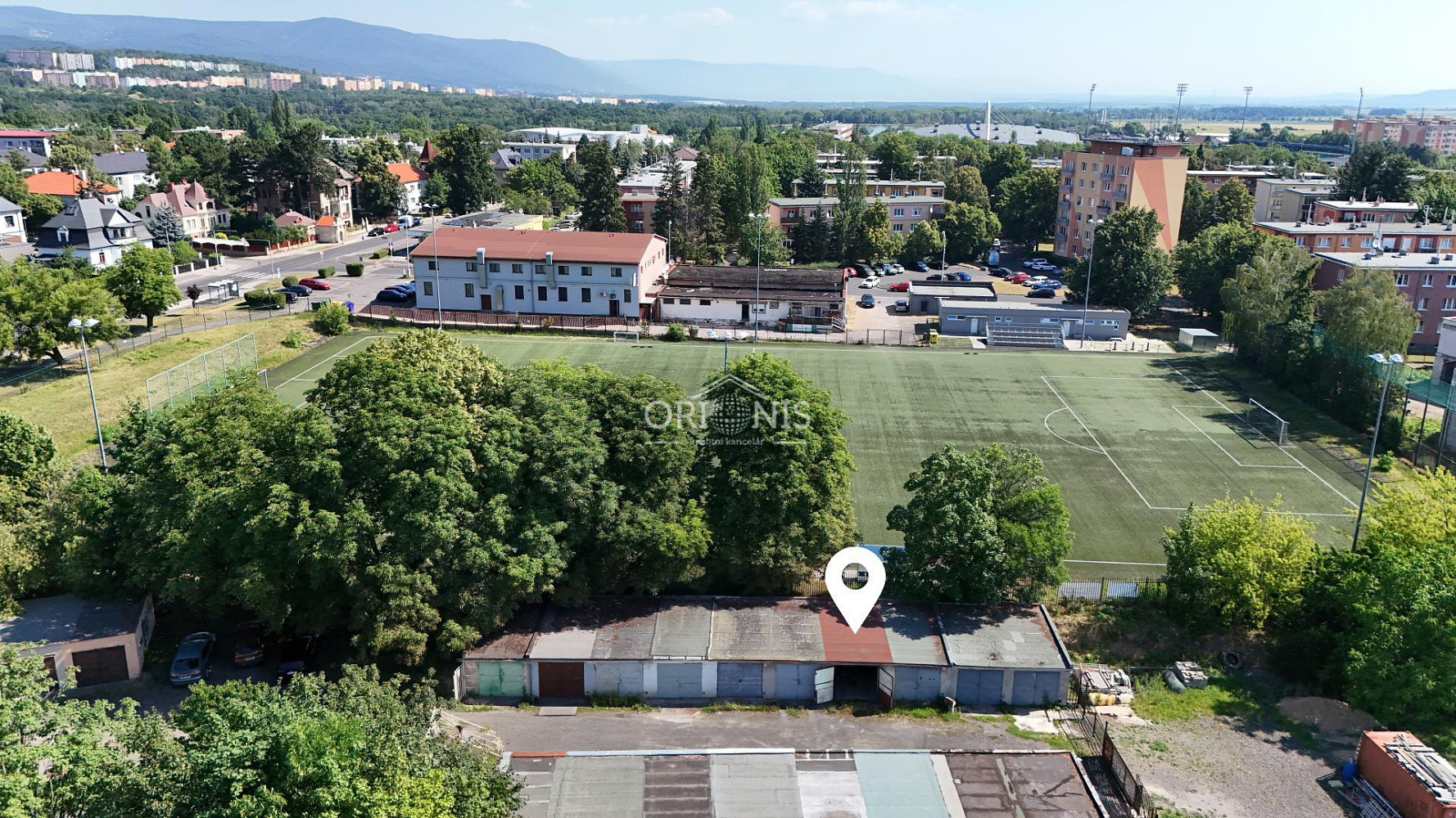 Prodej garáže 22 m2 v oploceném areálu, mostecká